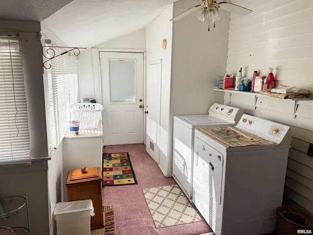 a storage room with a washer and dryer