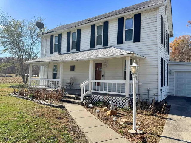 a front view of a house with a porch