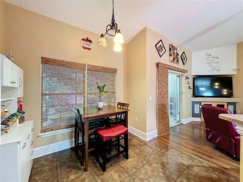 1312 Perkins Road Orlando, FL 32809 - Photo 24 of 80 a view of a livingroom with furniture window and wooden floor