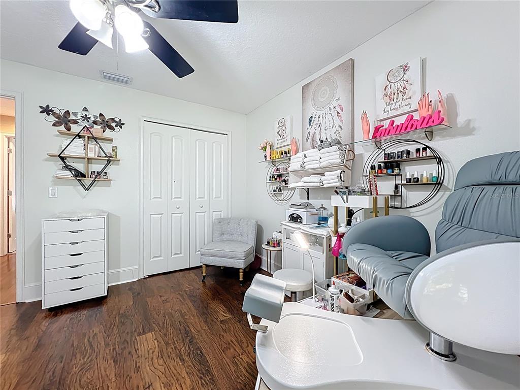 1312 Perkins Road Orlando, FL 32809 - Photo 48 of 80 a living room with furniture and wooden floor
