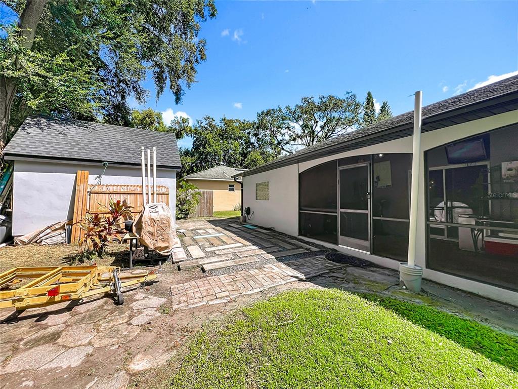1312 Perkins Road Orlando, FL 32809 - Photo 54 of 80 a view of a house with backyard