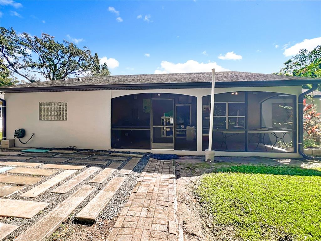1312 Perkins Road Orlando, FL 32809 - Photo 56 of 80 a view of backyard with a garden and plants