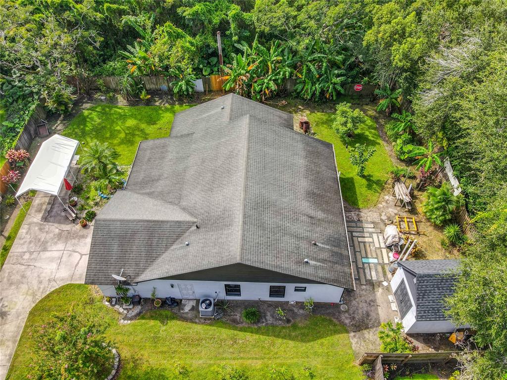 1312 Perkins Road Orlando, FL 32809 - Photo 59 of 80 an aerial view of a house with a yard