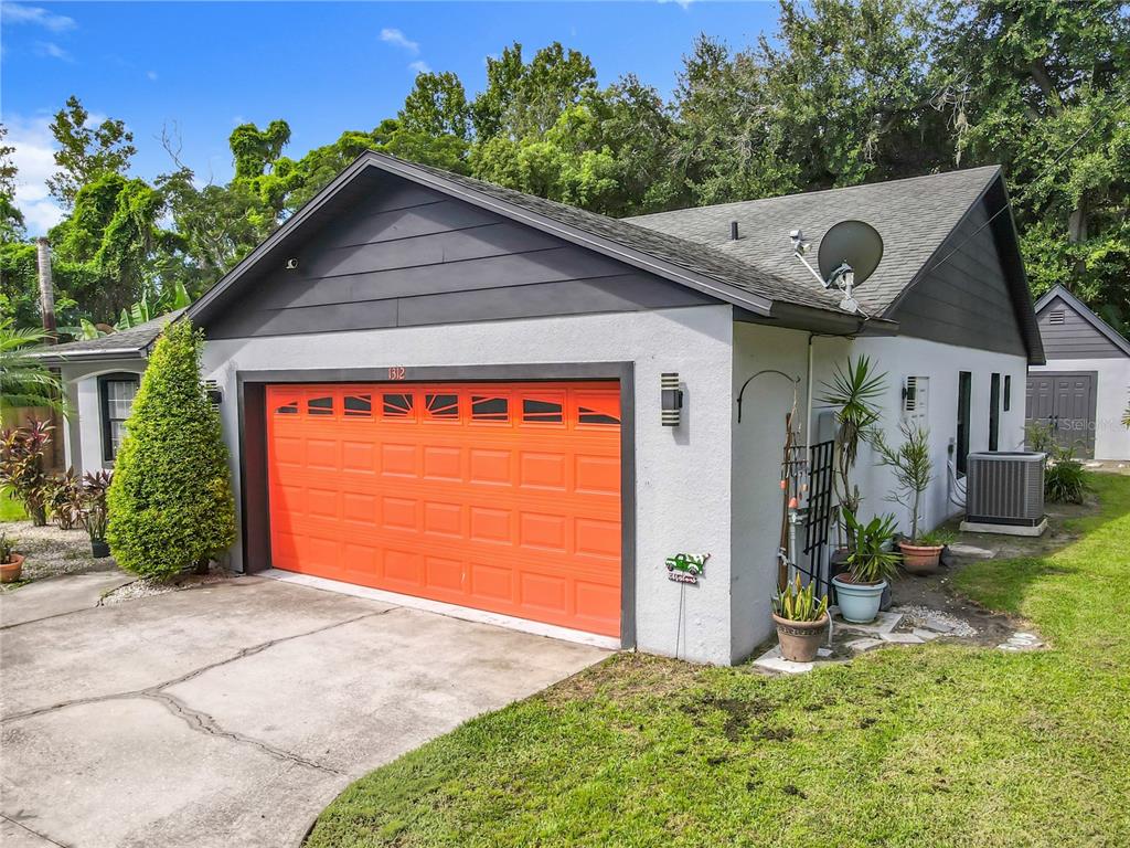 1312 Perkins Road Orlando, FL 32809 - Photo 7 of 80 a front view of house with yard