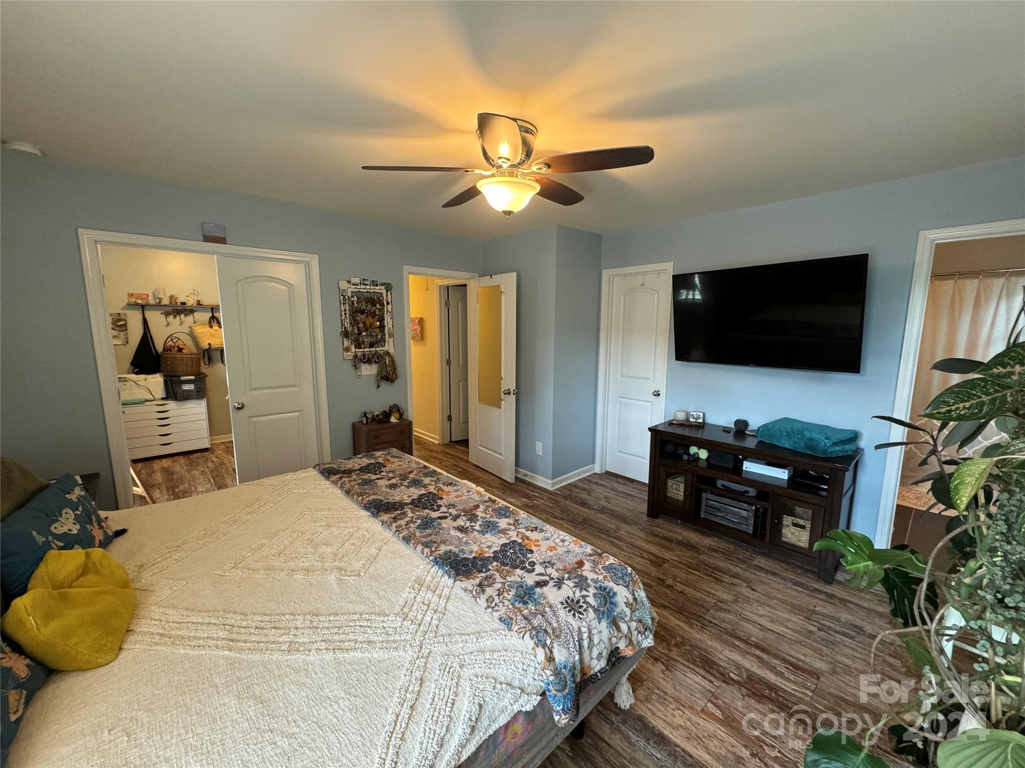162 Limerick Road, Unit A Mooresville, NC 28115 - Photo 16 of 20 a bedroom with a bed and a flat tv screen on dresser