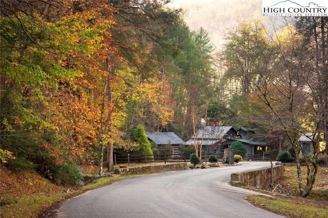 78 Holleridge Road Ferguson, NC 28624 - Photo 13 of 14 a view of a street with houses