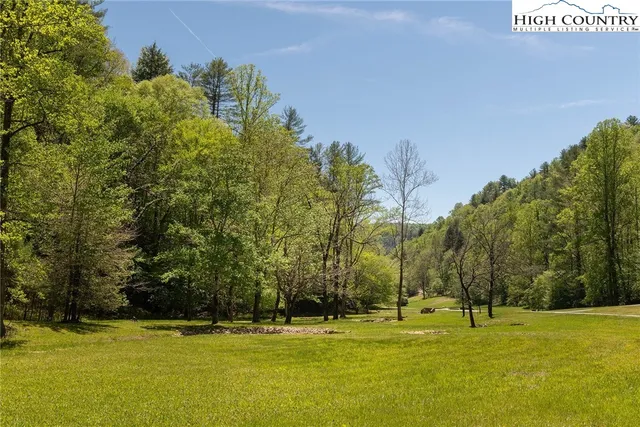 a view of a playground with basketball court