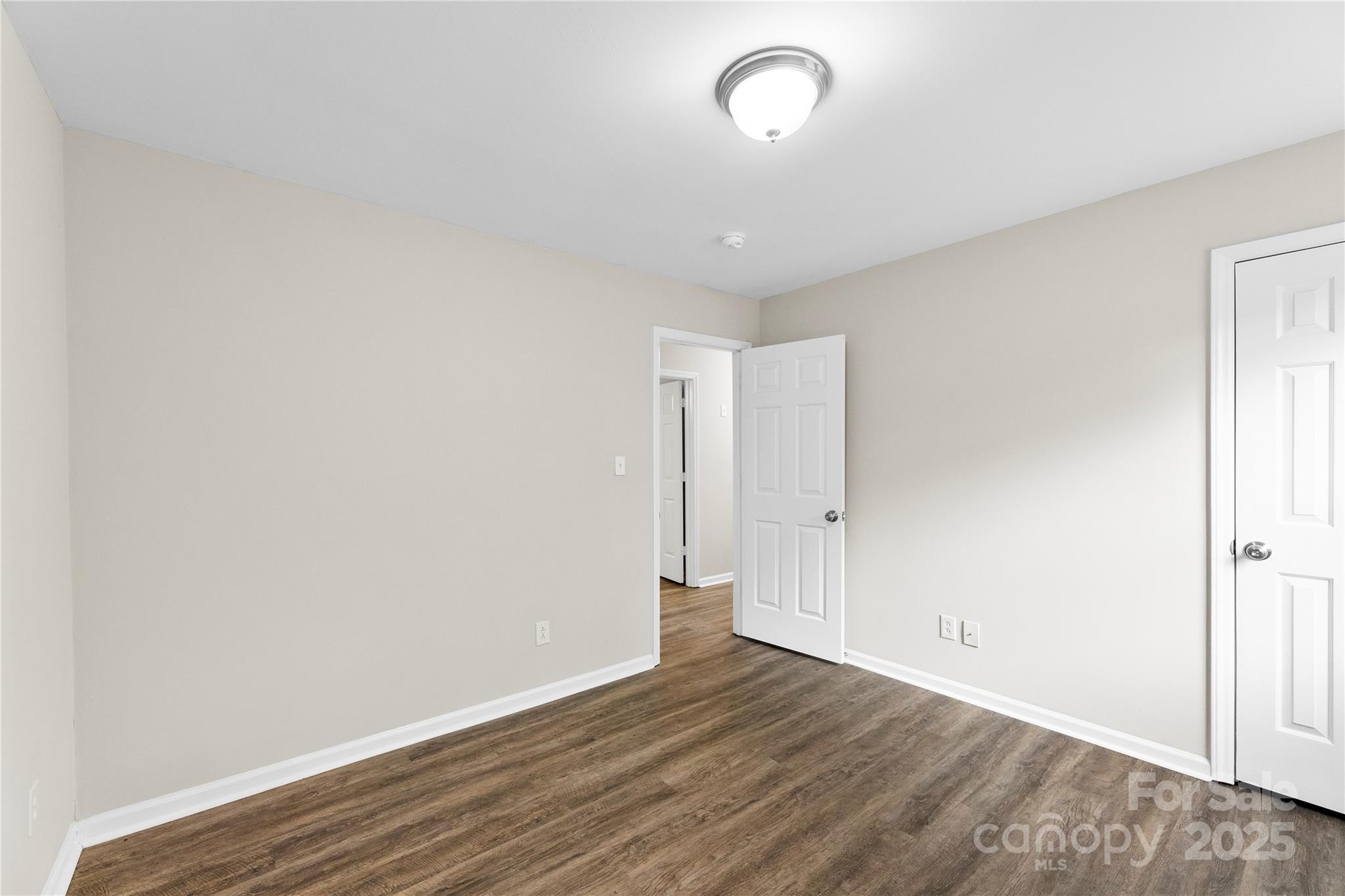 2713 Faircroft Way Monroe, NC 28110 - Photo 11 of 25 a view of a room with wooden floor