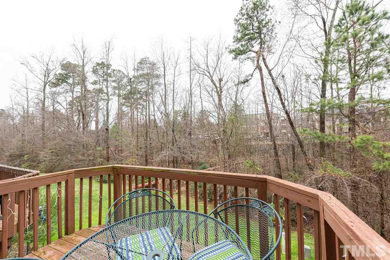 7749 Winners Edge Street Raleigh, NC 27617 - Photo 26 of 29 a view of a balcony with yard