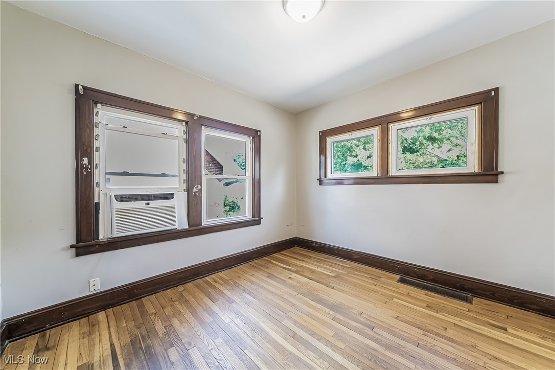 1801 Rockefeller Road Wickliffe, OH 44092 - Photo 16 of 37 Empty room featuring light hardwood / wood-style flooring and cooling unit