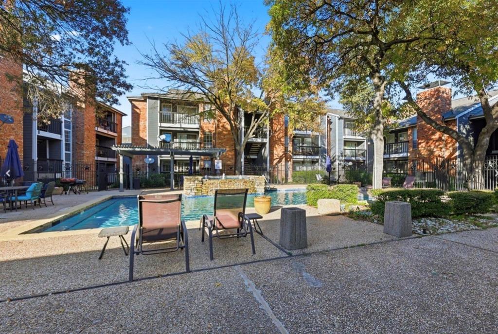 18333 Roehampton Drive, Unit 624 Dallas, TX 75252 - Photo 38 of 39 a view of a house with backyard and sitting area
