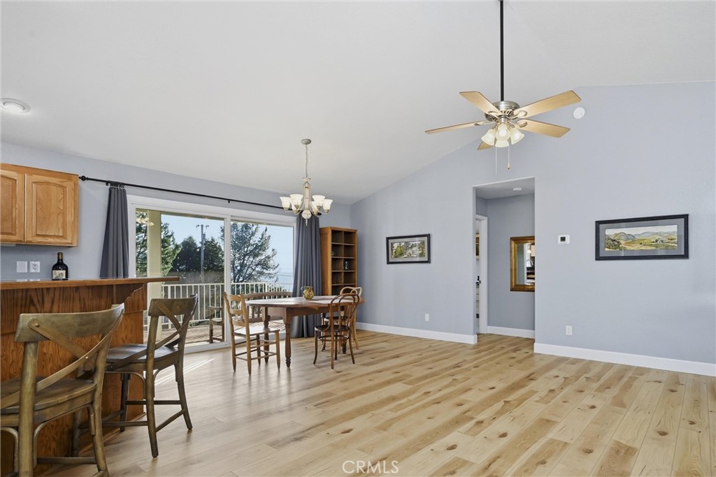 19093 Ravenhill Road Hidden Valley Lake, CA 95467 - Photo 13 of 30 a view of a livingroom with furniture window and wooden floor