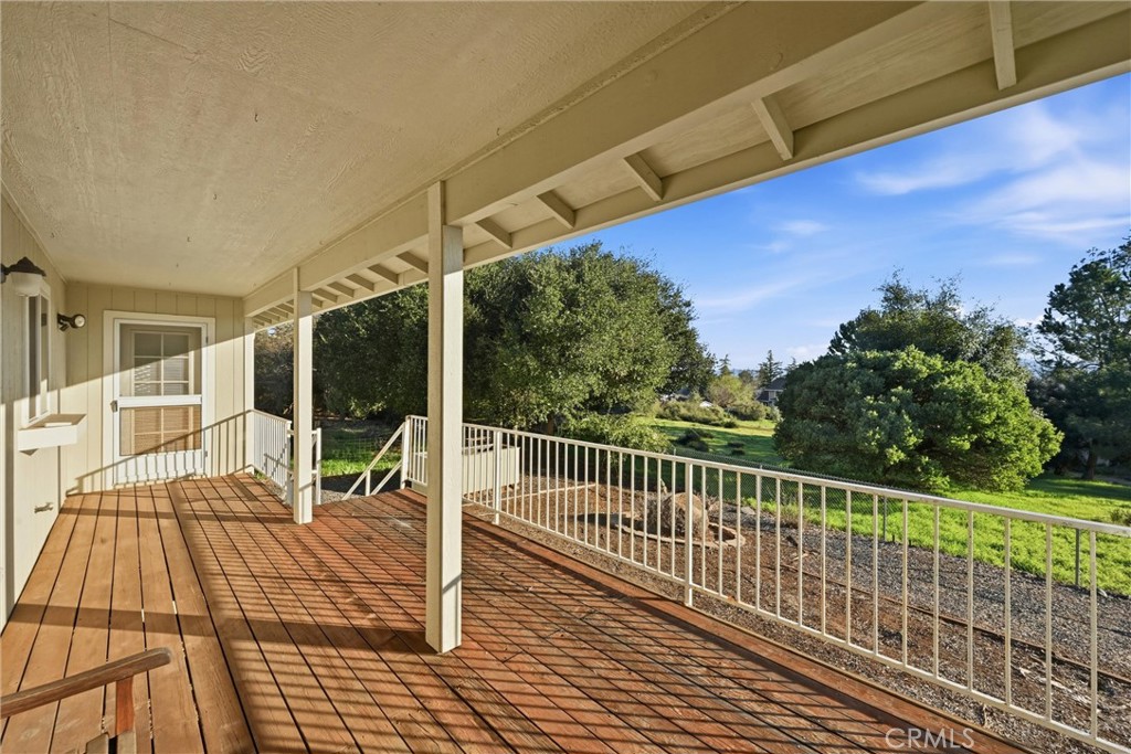 19093 Ravenhill Road Hidden Valley Lake, CA 95467 - Photo 27 of 30 a view of balcony with wooden floor and outdoor space
