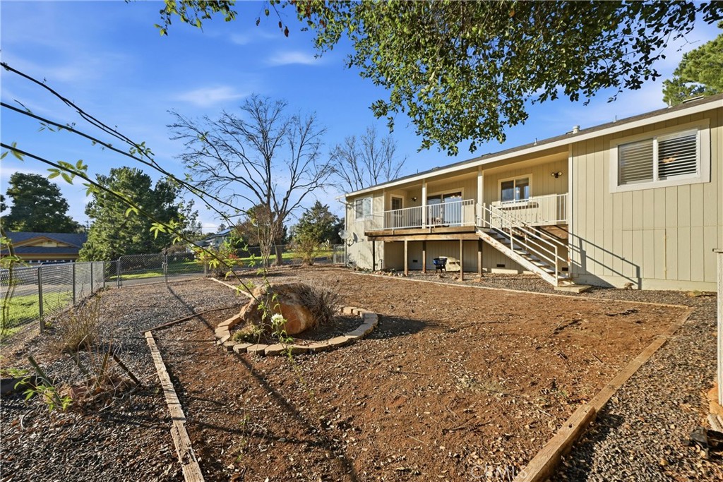 19093 Ravenhill Road Hidden Valley Lake, CA 95467 - Photo 30 of 30 a front view of a house with garden