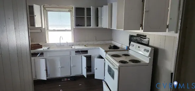 a bathroom with a tub and toilet