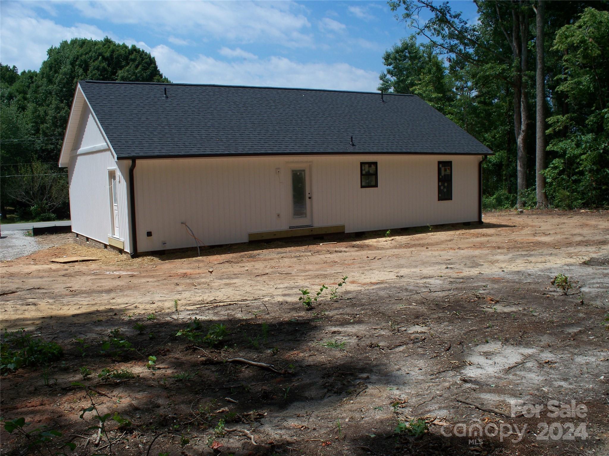 5372 Crouse Road, Unit 3 Crouse, NC 28033 - Photo 6 of 23 a front view of a house with a yard