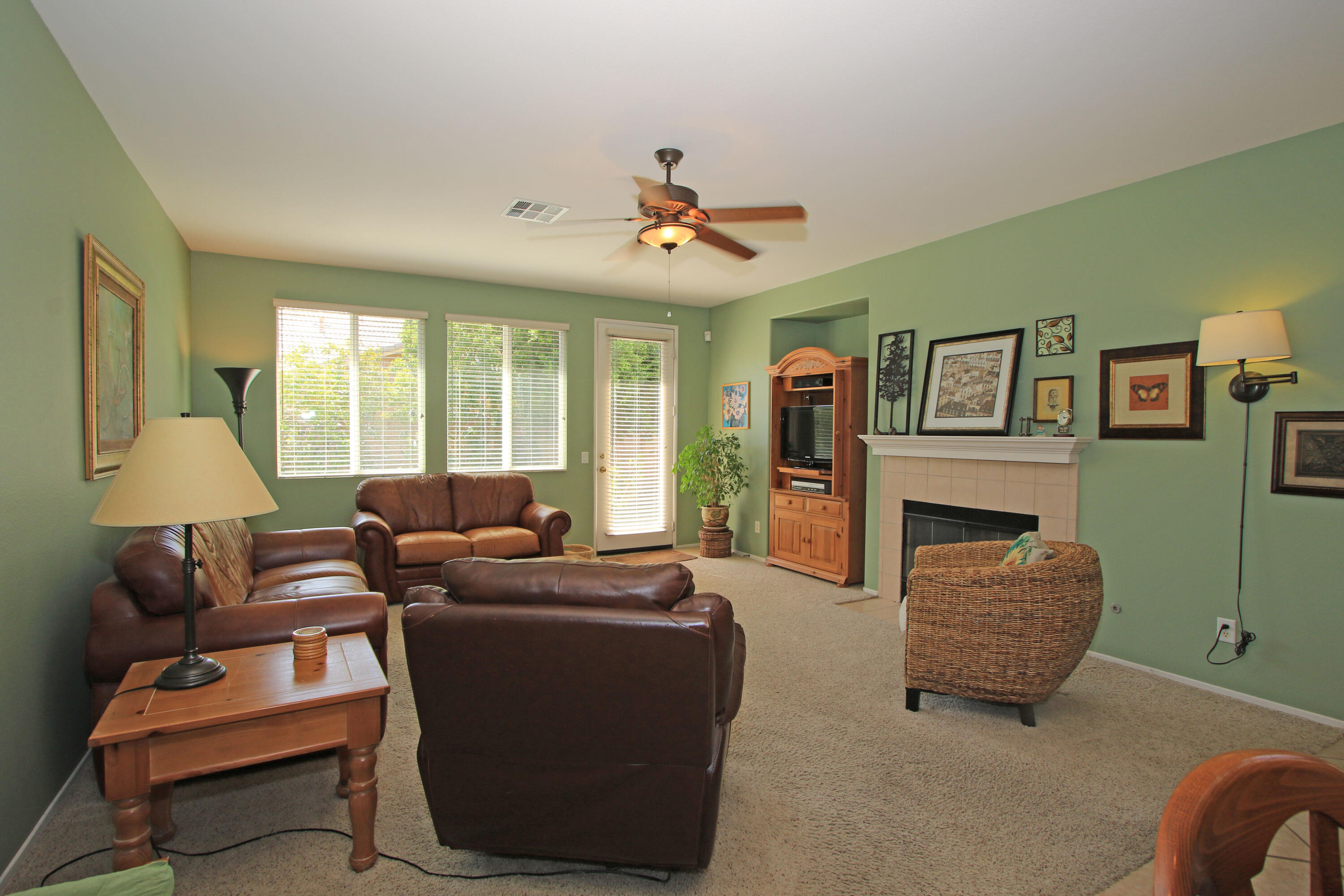 37330 Haweswater Road Indio, CA 92203 - Photo 19 of 47 a living room with furniture and a fireplace