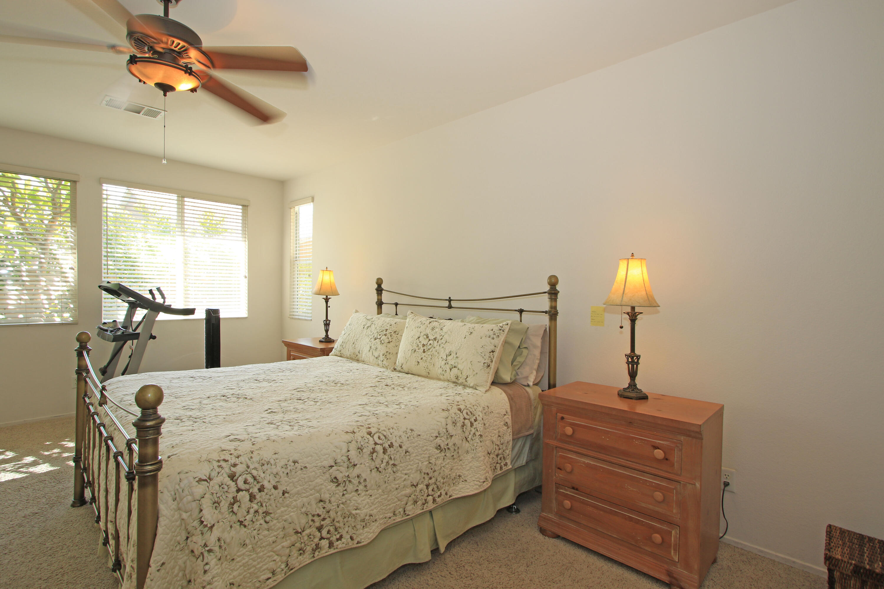 37330 Haweswater Road Indio, CA 92203 - Photo 21 of 47 a bed room with a bed and a night stand