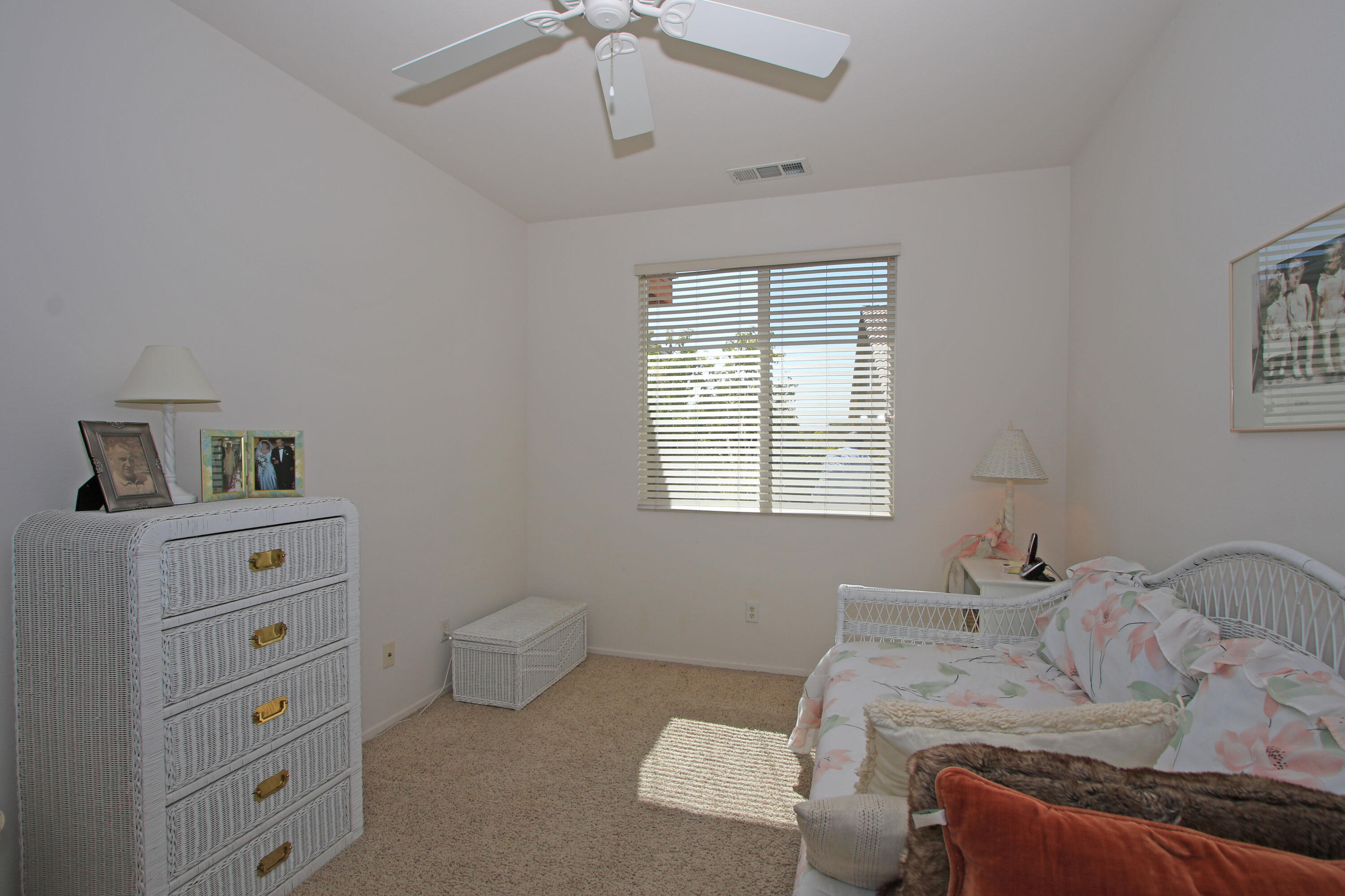 37330 Haweswater Road Indio, CA 92203 - Photo 26 of 47 a bedroom with a bed and a window