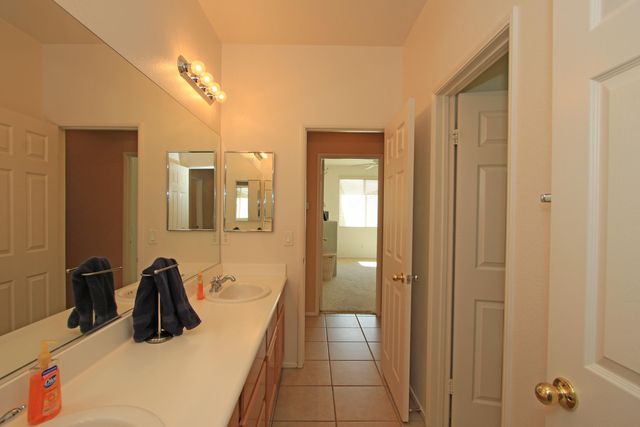 a bathroom with a sink and mirror