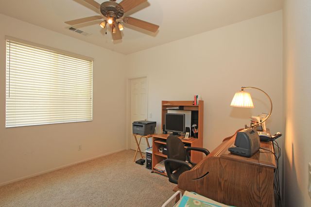 a view of a workspace with furniture