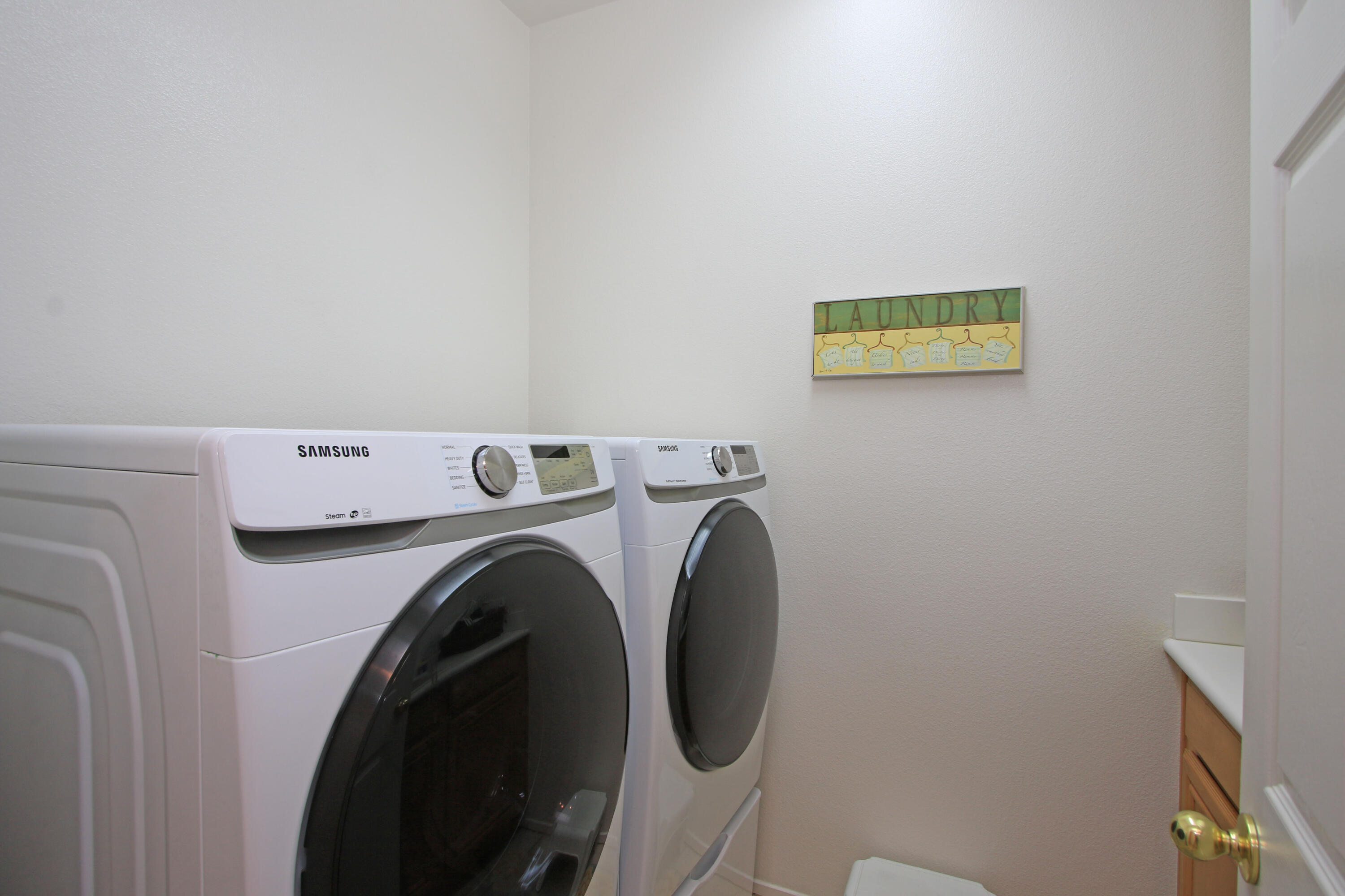 37330 Haweswater Road Indio, CA 92203 - Photo 34 of 47 a utility room with dryer and washer