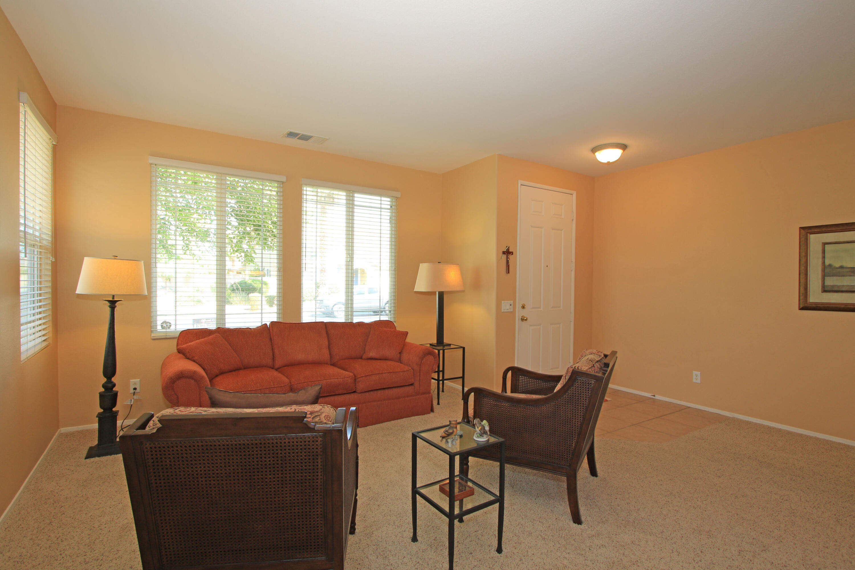 37330 Haweswater Road Indio, CA 92203 - Photo 4 of 47 a living room with furniture and a large window