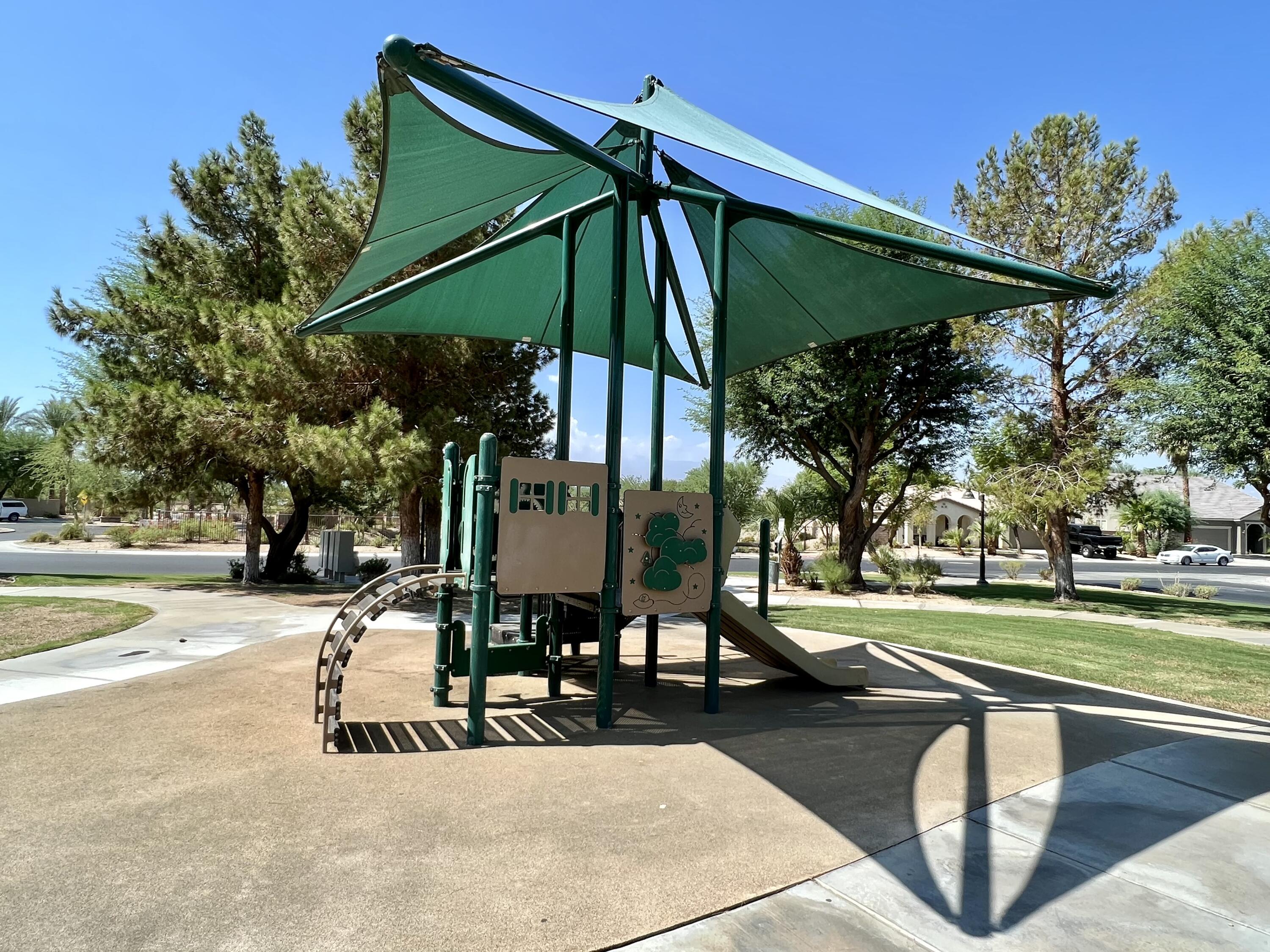 37330 Haweswater Road Indio, CA 92203 - Photo 45 of 47 an outdoor space with furniture and umbrella