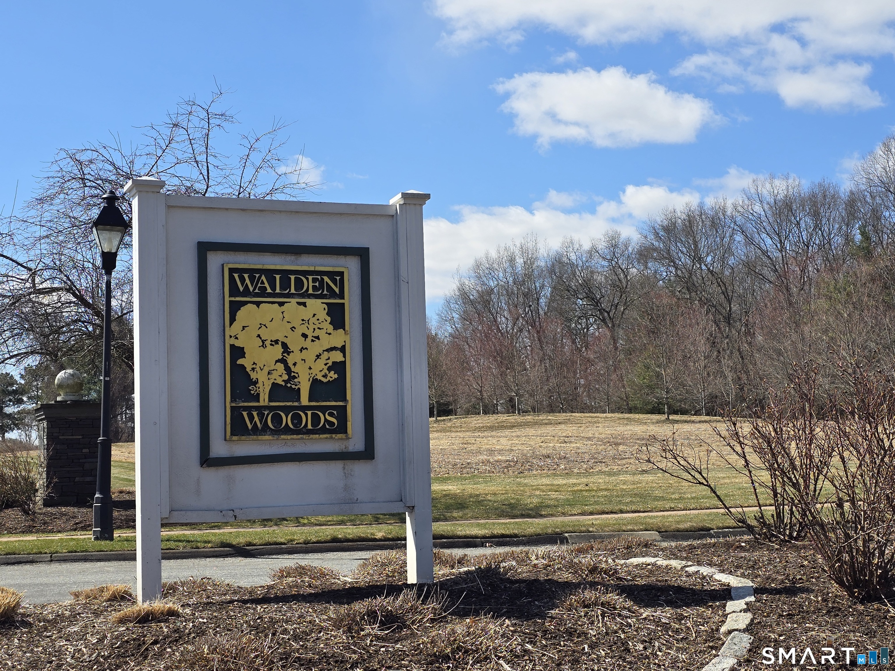 5 Haskins Road, Unit 5 Windsor, CT 06095 - Photo 11 of 40 a view of a door in the backyard