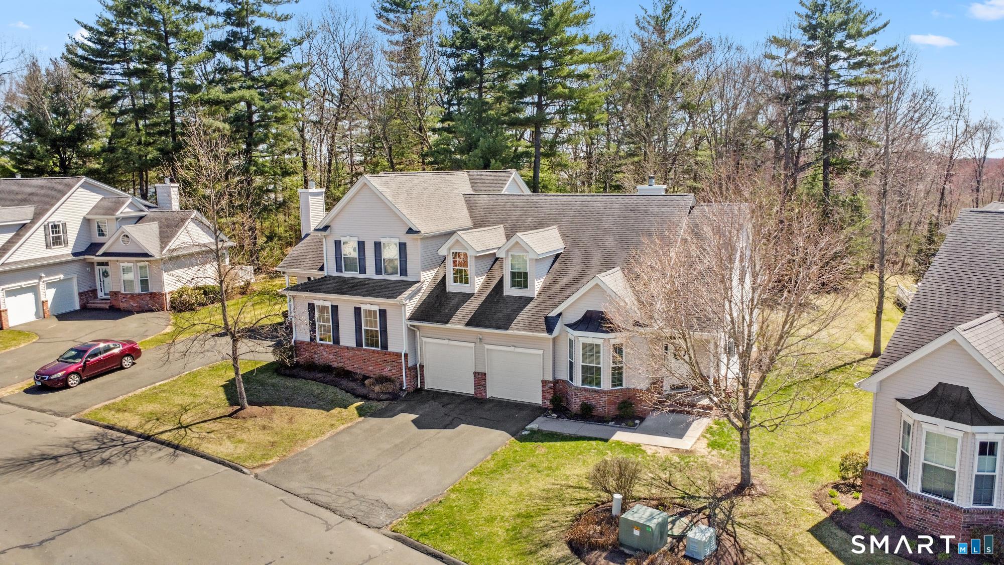 5 Haskins Road, Unit 5 Windsor, CT 06095 - Photo 13 of 40 an aerial view of a house with swimming pool and sitting area