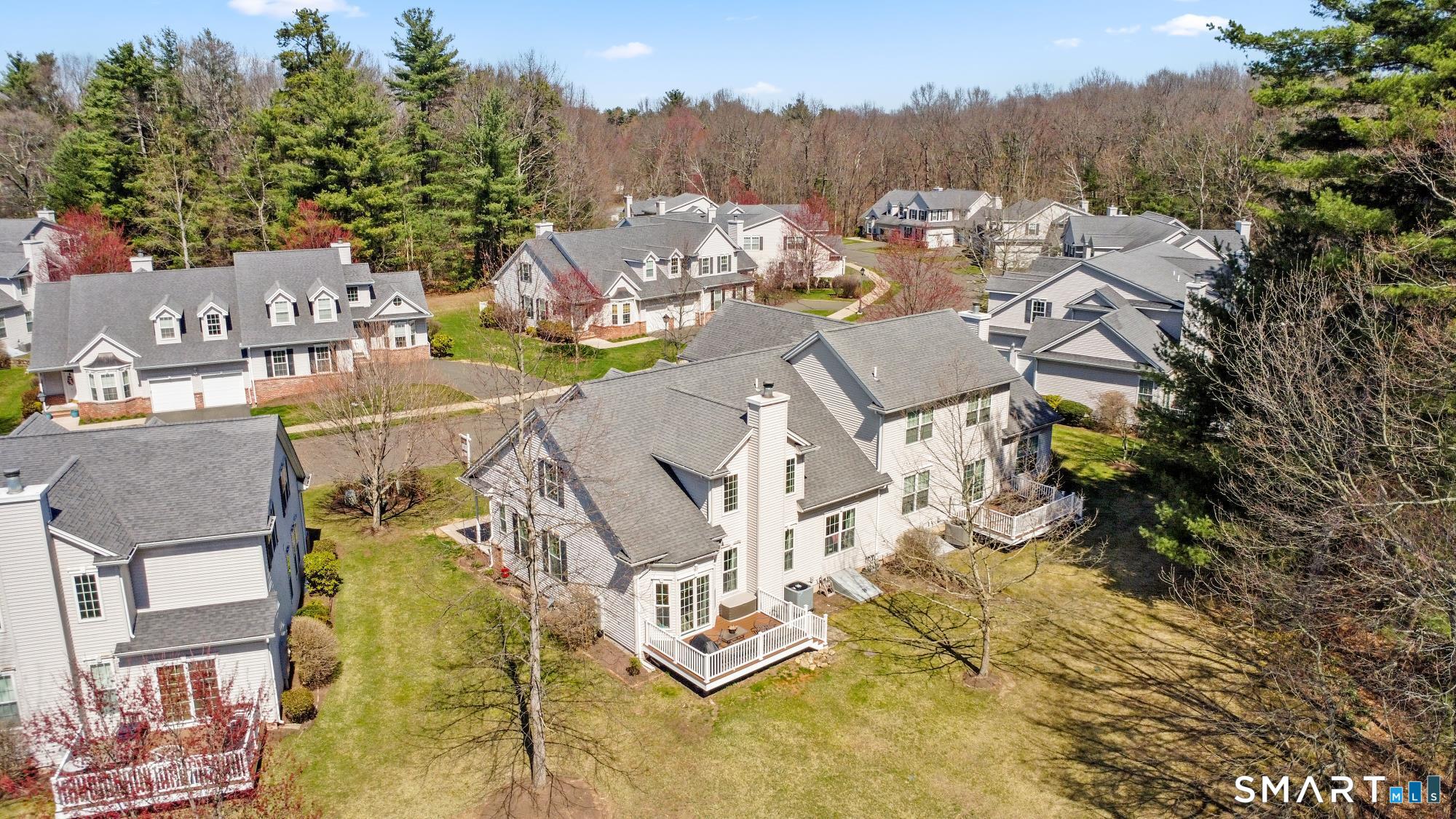 5 Haskins Road, Unit 5 Windsor, CT 06095 - Photo 14 of 40 an aerial view of residential houses with outdoor space and trees