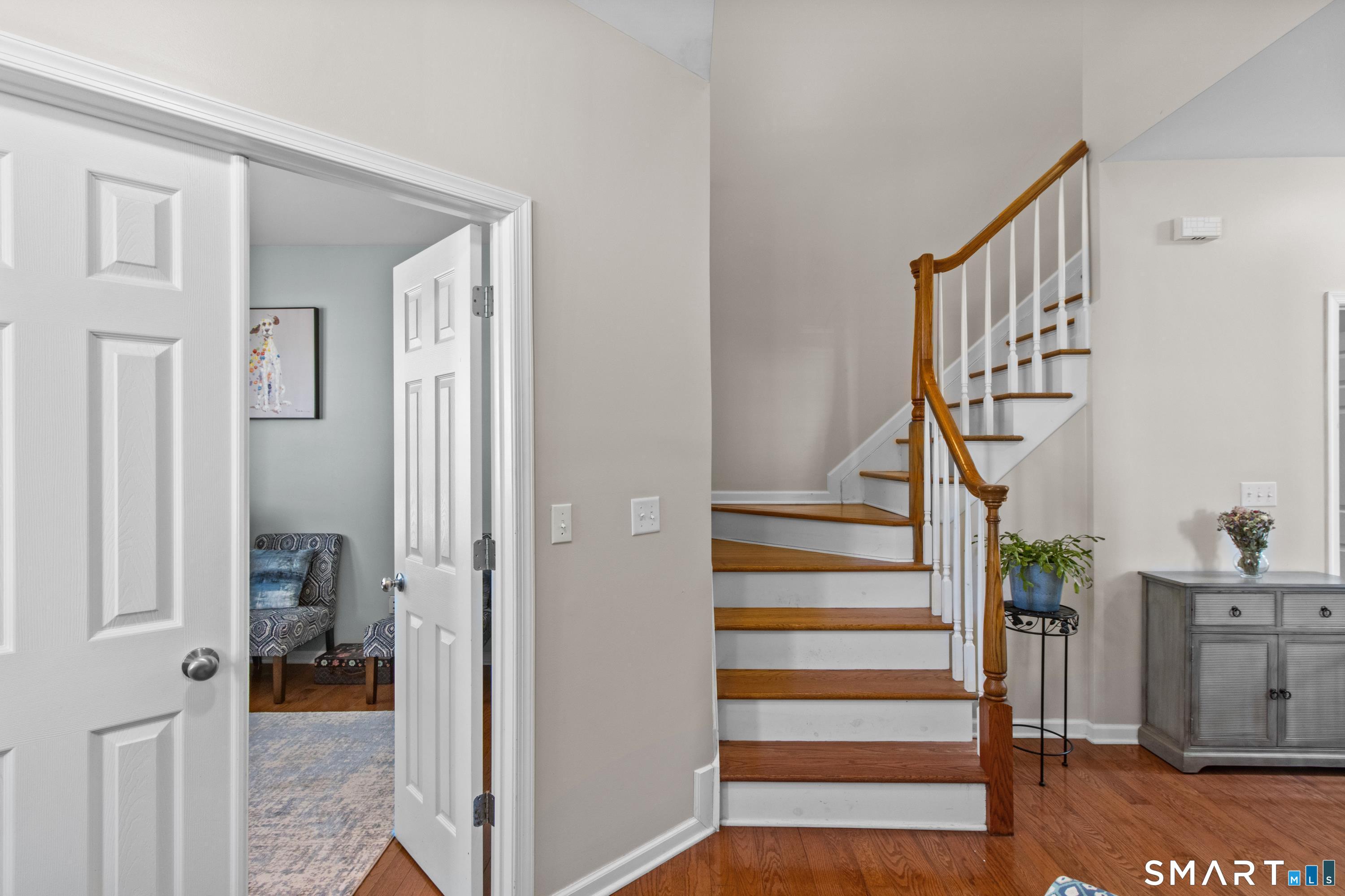 5 Haskins Road, Unit 5 Windsor, CT 06095 - Photo 18 of 40 a view of entryway and hall with wooden floor