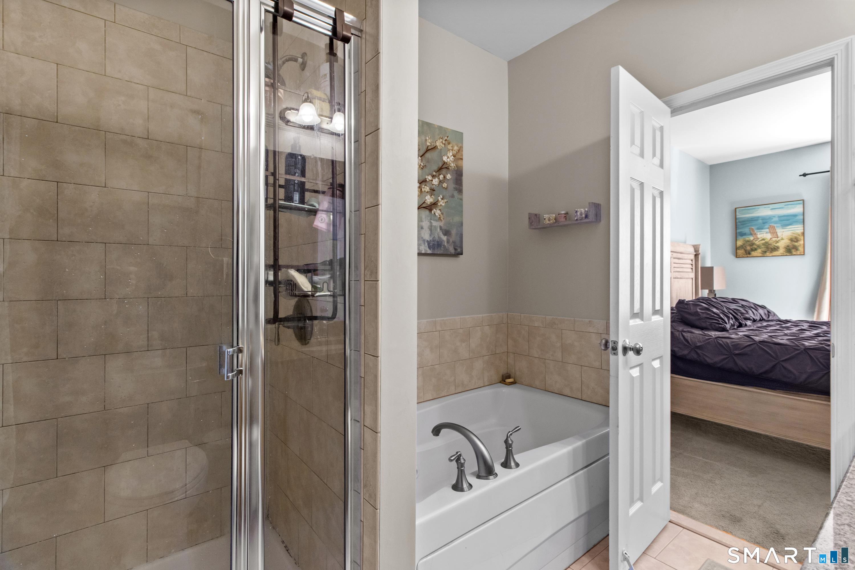 5 Haskins Road, Unit 5 Windsor, CT 06095 - Photo 27 of 40 a bathroom with a tub and shower