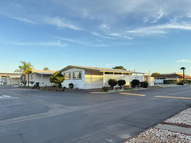 a view of a city street with a building