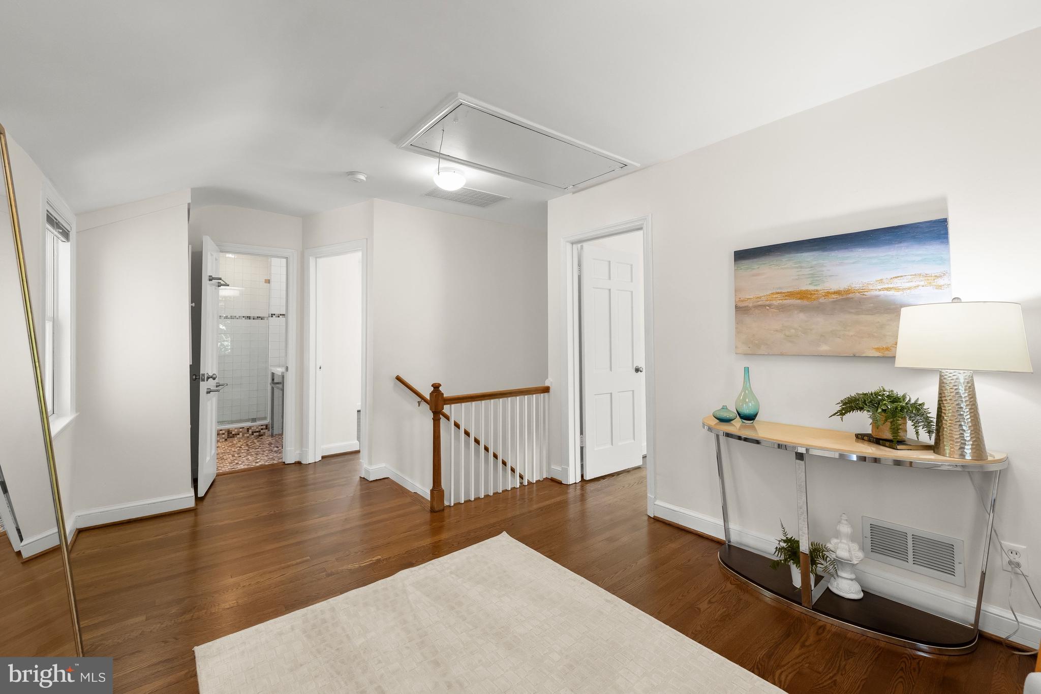 8800 Maywood Avenue Silver Spring, MD 20910 - Photo 18 of 41 a workspace with furniture and wooden floor