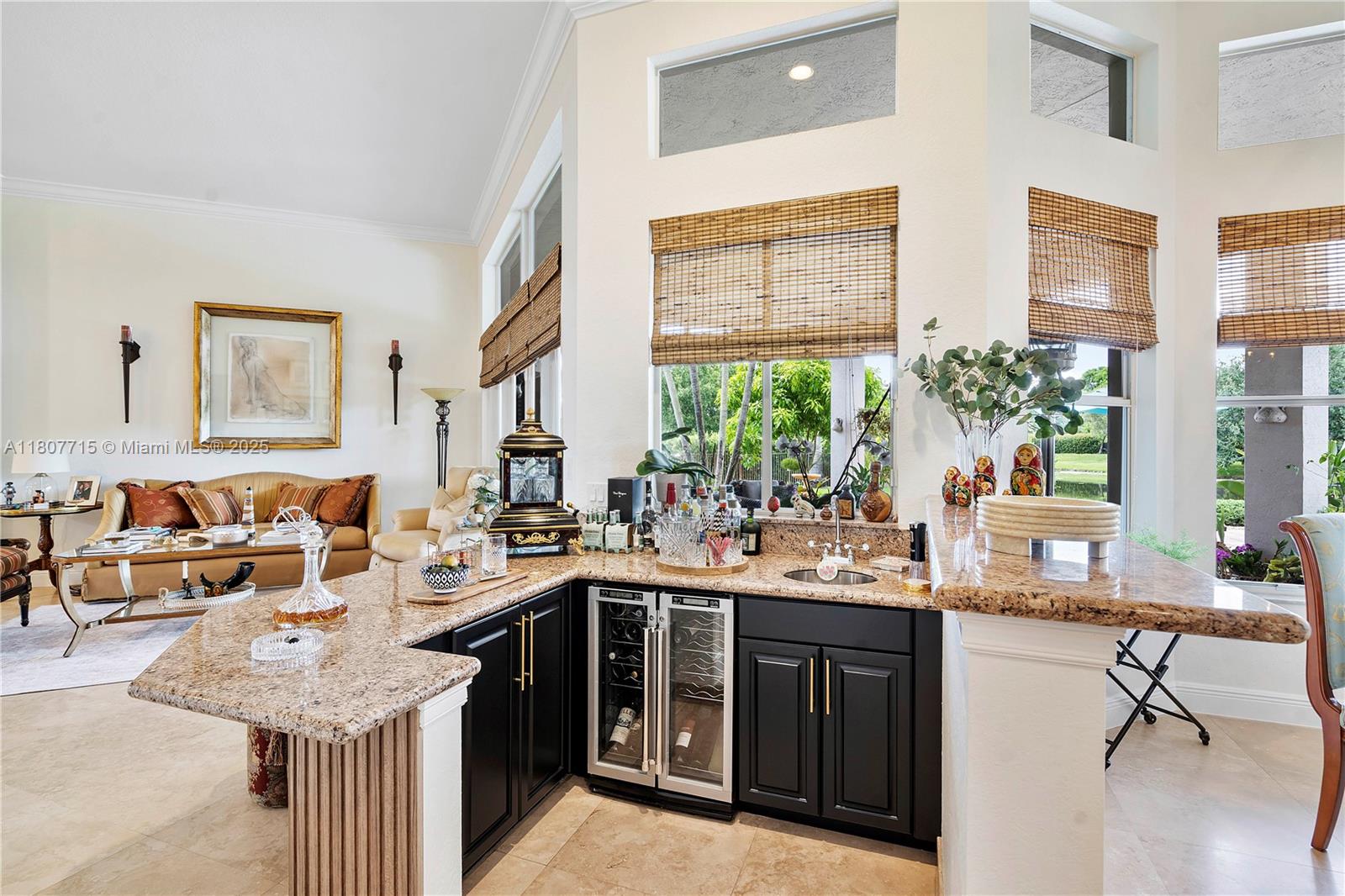 14933 Southwest 33rd Street Davie, FL 33331 - Photo 20 of 88 a kitchen with a sink stove and cabinets