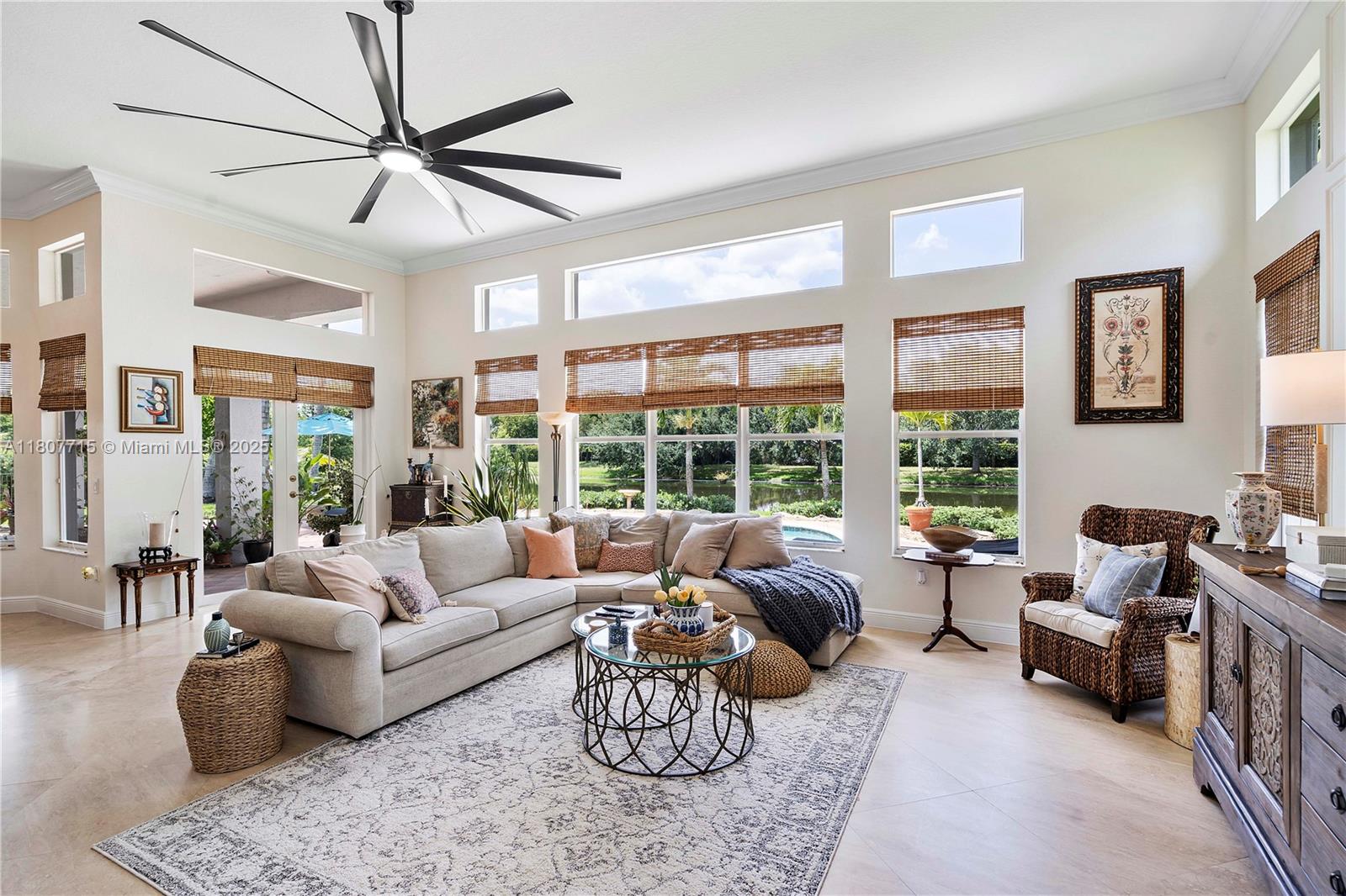 14933 Southwest 33rd Street Davie, FL 33331 - Photo 32 of 88 a living room with furniture and a large window