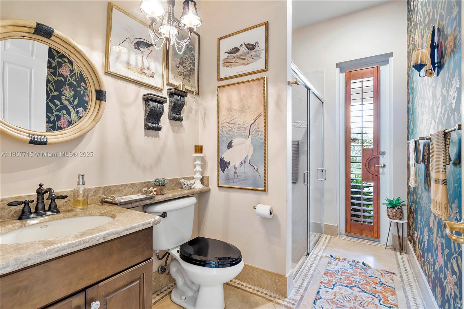 14933 Southwest 33rd Street Davie, FL 33331 - Photo 35 of 88 a bathroom with a sink and a mirror