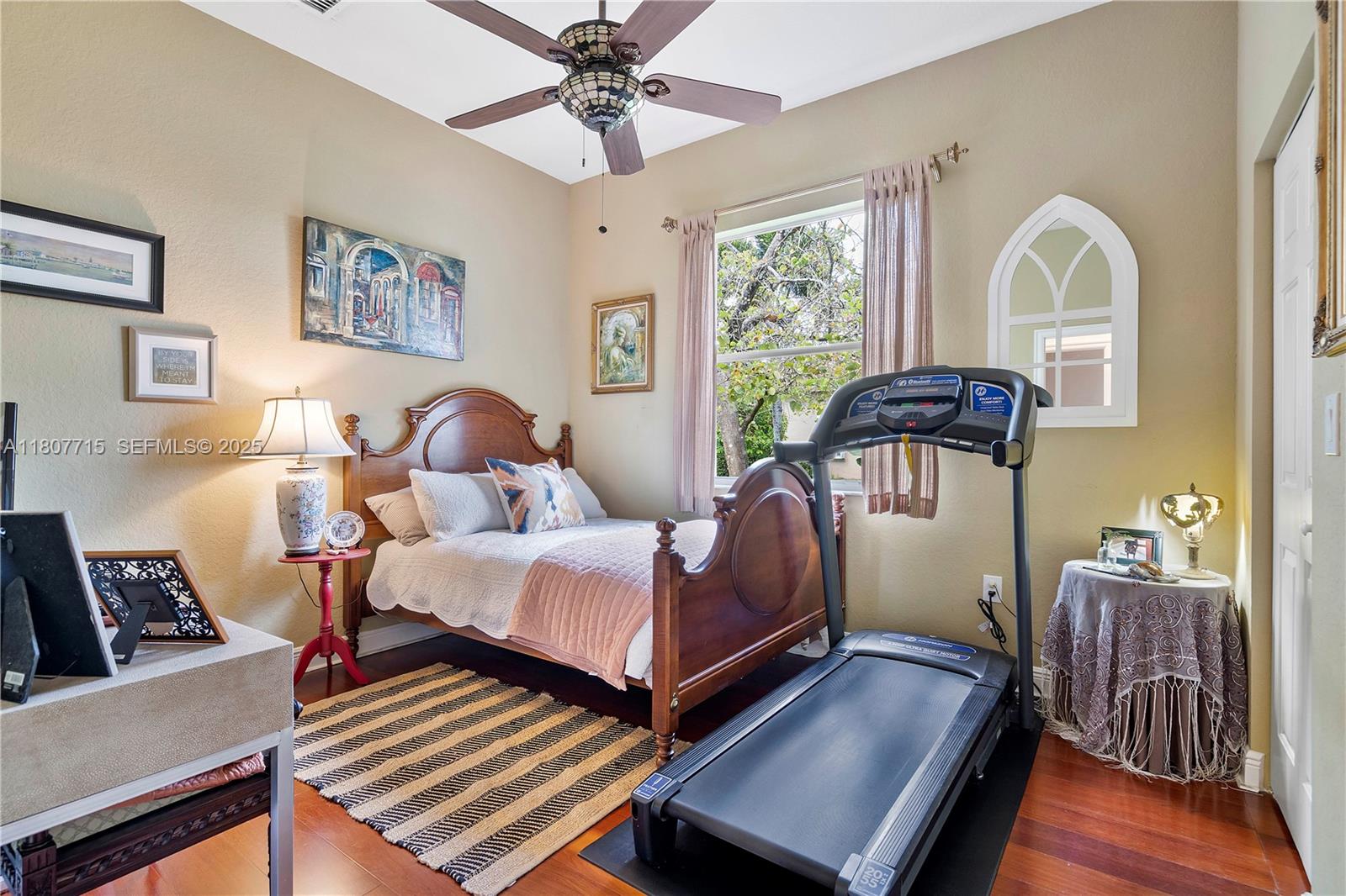 14933 Southwest 33rd Street Davie, FL 33331 - Photo 47 of 88 a bedroom with two beds and a chandelier