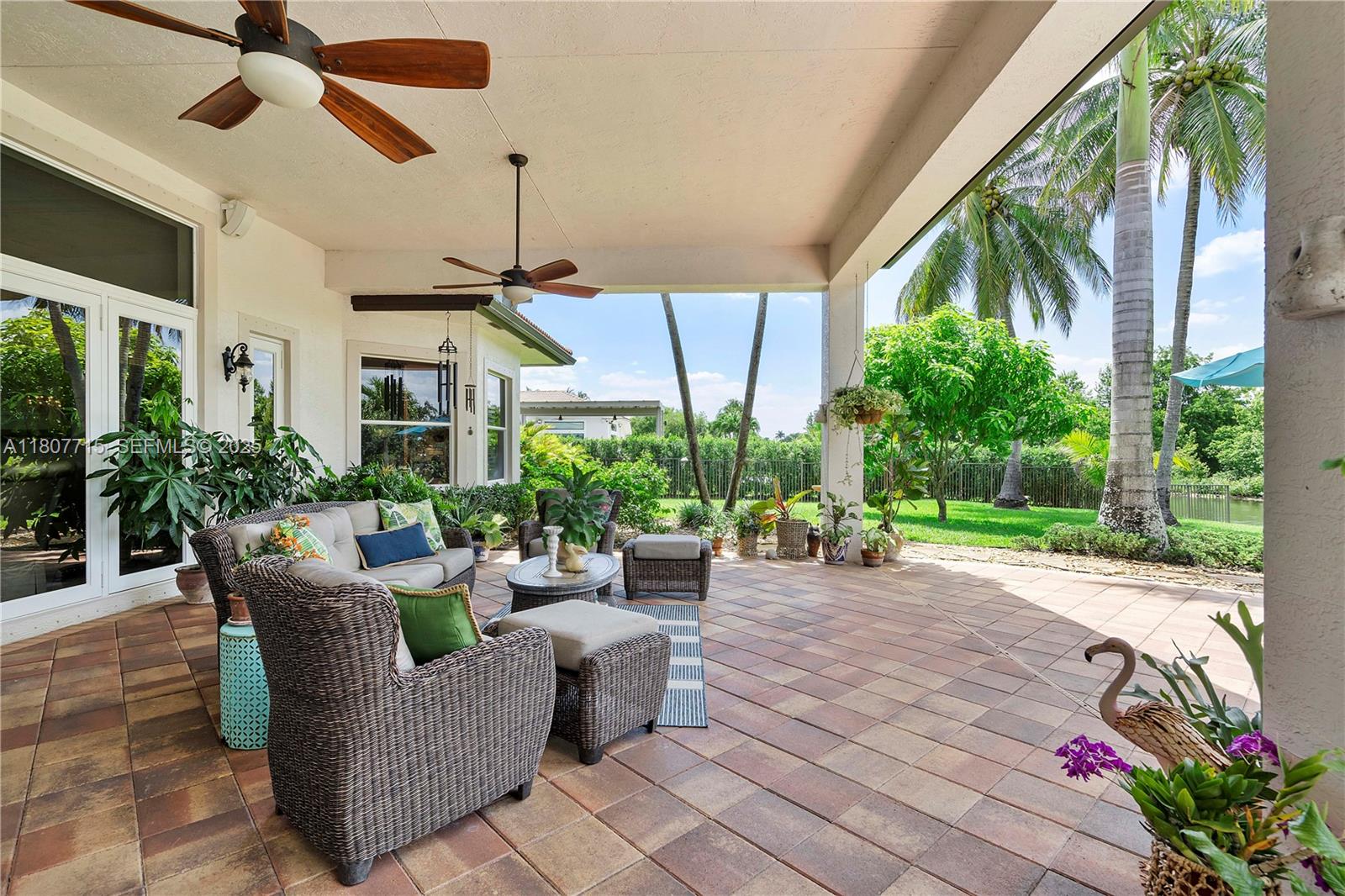 14933 Southwest 33rd Street Davie, FL 33331 - Photo 50 of 88 a view of a patio with couches and potted plants