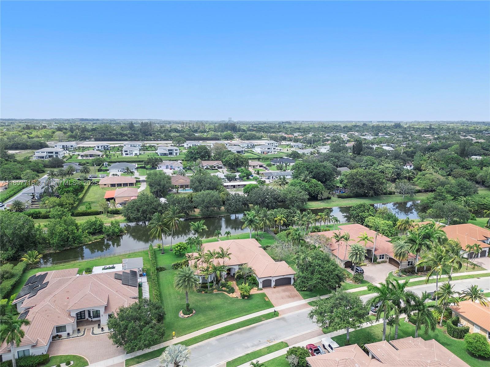 14933 Southwest 33rd Street Davie, FL 33331 - Photo 78 of 88 an aerial view of a city with lots of residential buildings