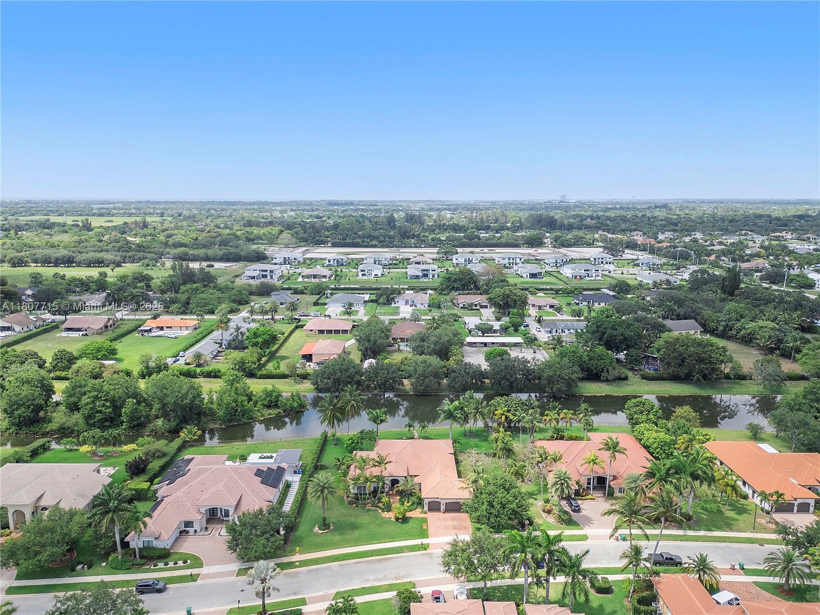14933 Southwest 33rd Street Davie, FL 33331 - Photo 79 of 88 an aerial view of residential houses with outdoor space and river