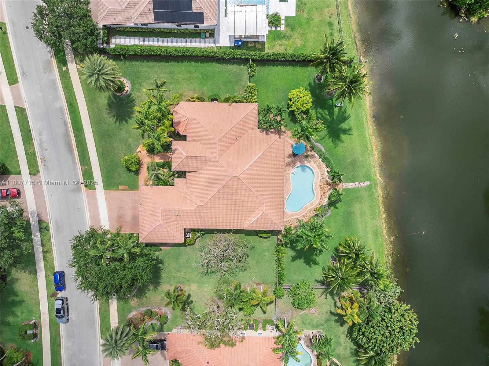 14933 Southwest 33rd Street Davie, FL 33331 - Photo 81 of 88 an aerial view of a house with a garden and lake view