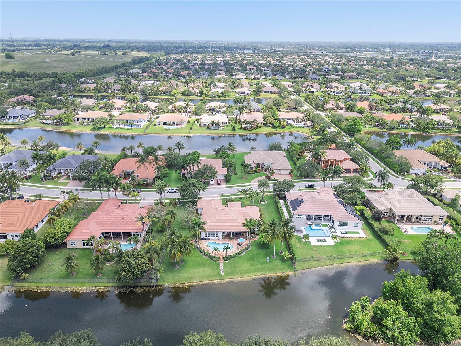 14933 Southwest 33rd Street Davie, FL 33331 - Photo 82 of 88 an aerial view of residential houses with outdoor space and street view