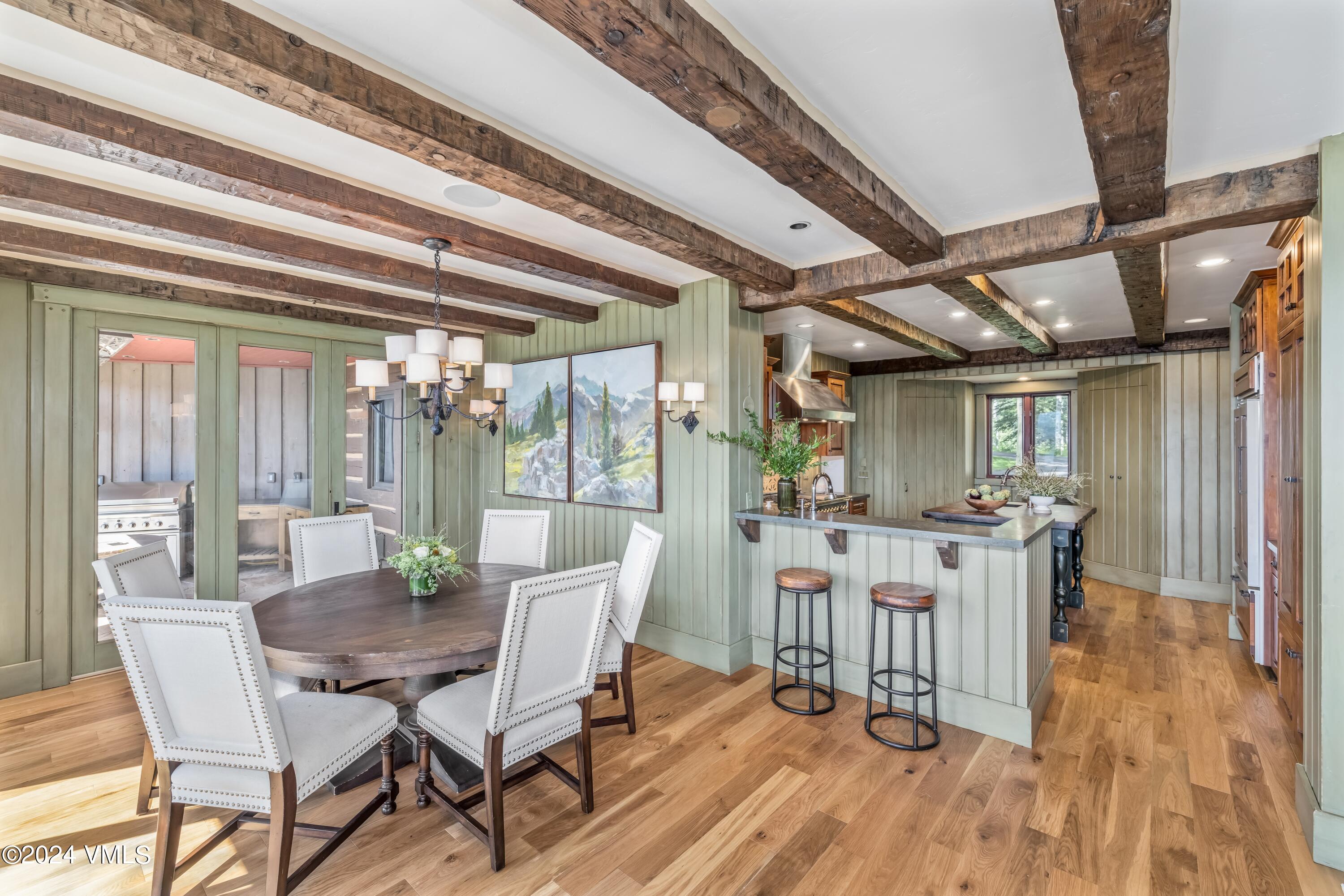 48 Jasmine Avon, CO 81620 - Photo 11 of 67 a view of a dining room with furniture window and outside view