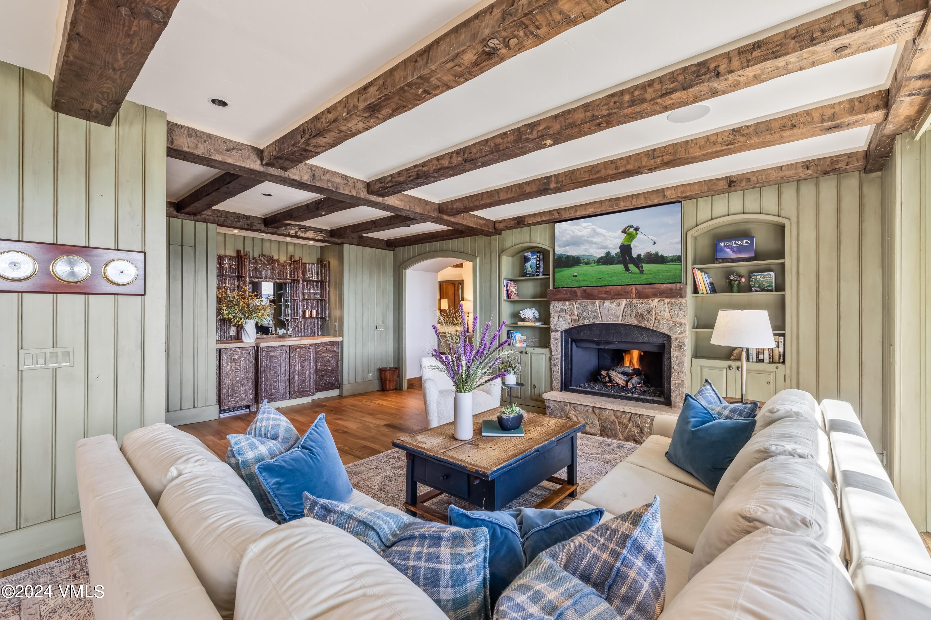 48 Jasmine Avon, CO 81620 - Photo 14 of 67 a living room with furniture and a fireplace