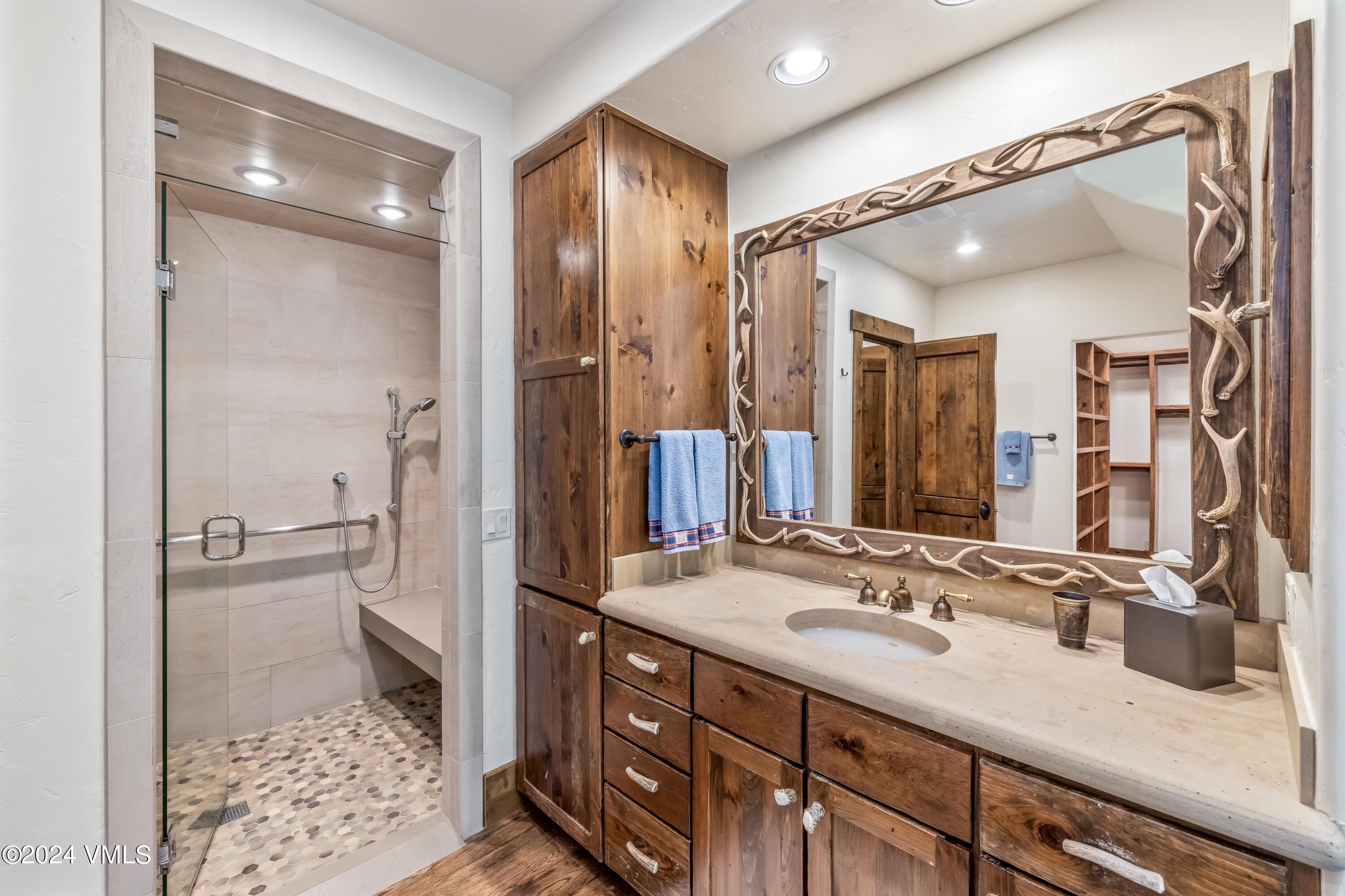 48 Jasmine Avon, CO 81620 - Photo 27 of 67 a bathroom with a sink double vanity and a shower