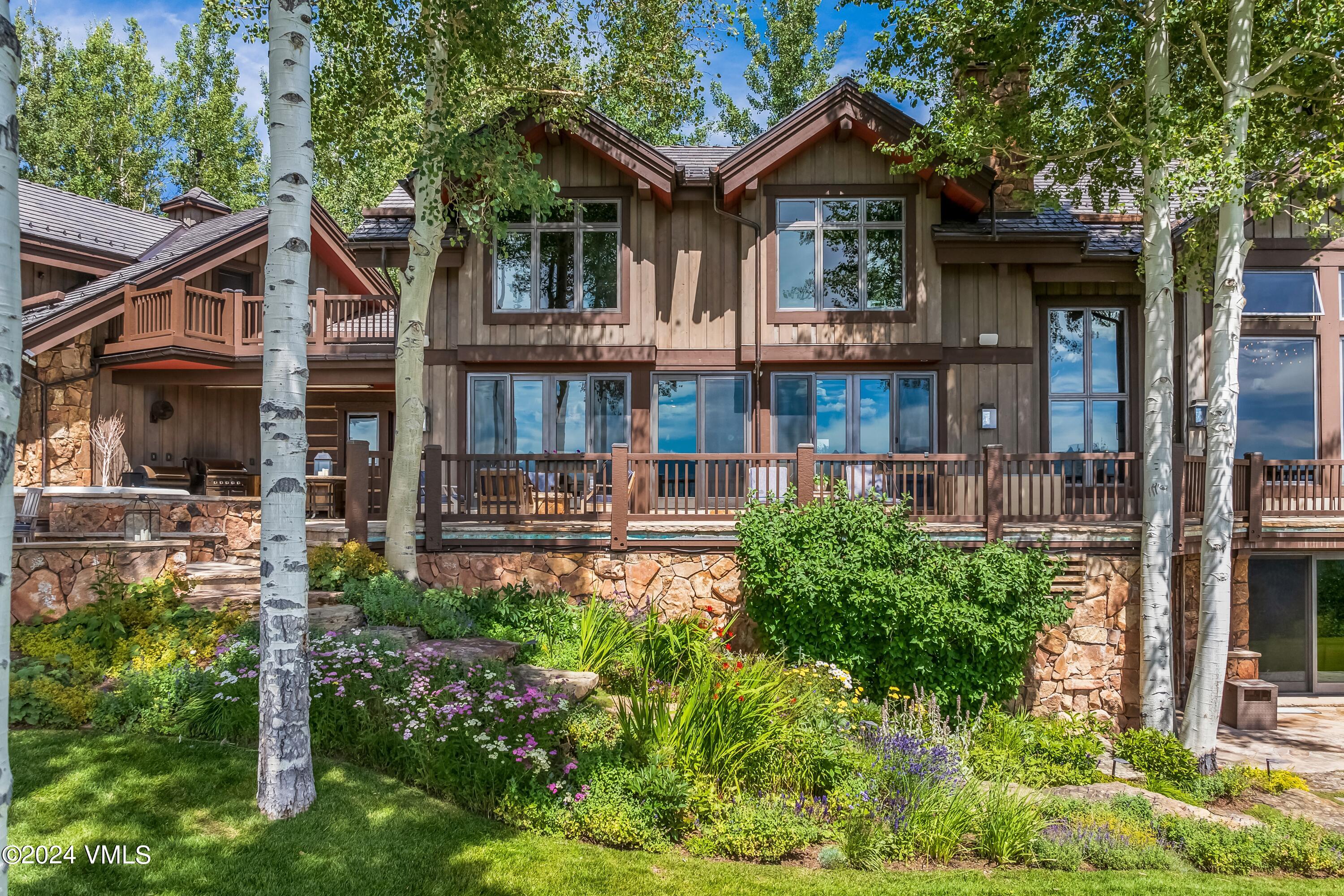 48 Jasmine Avon, CO 81620 - Photo 30 of 67 front view of a house with a small yard