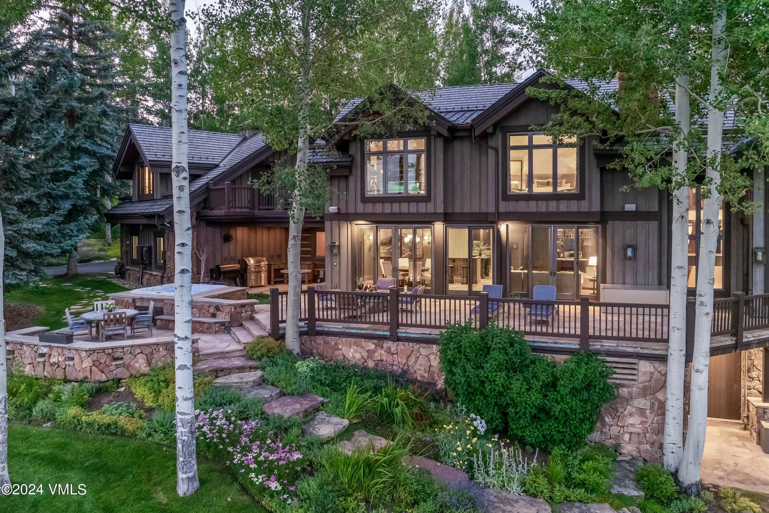 48 Jasmine Avon, CO 81620 - Photo 4 of 67 a view of a house with a yard and sitting area