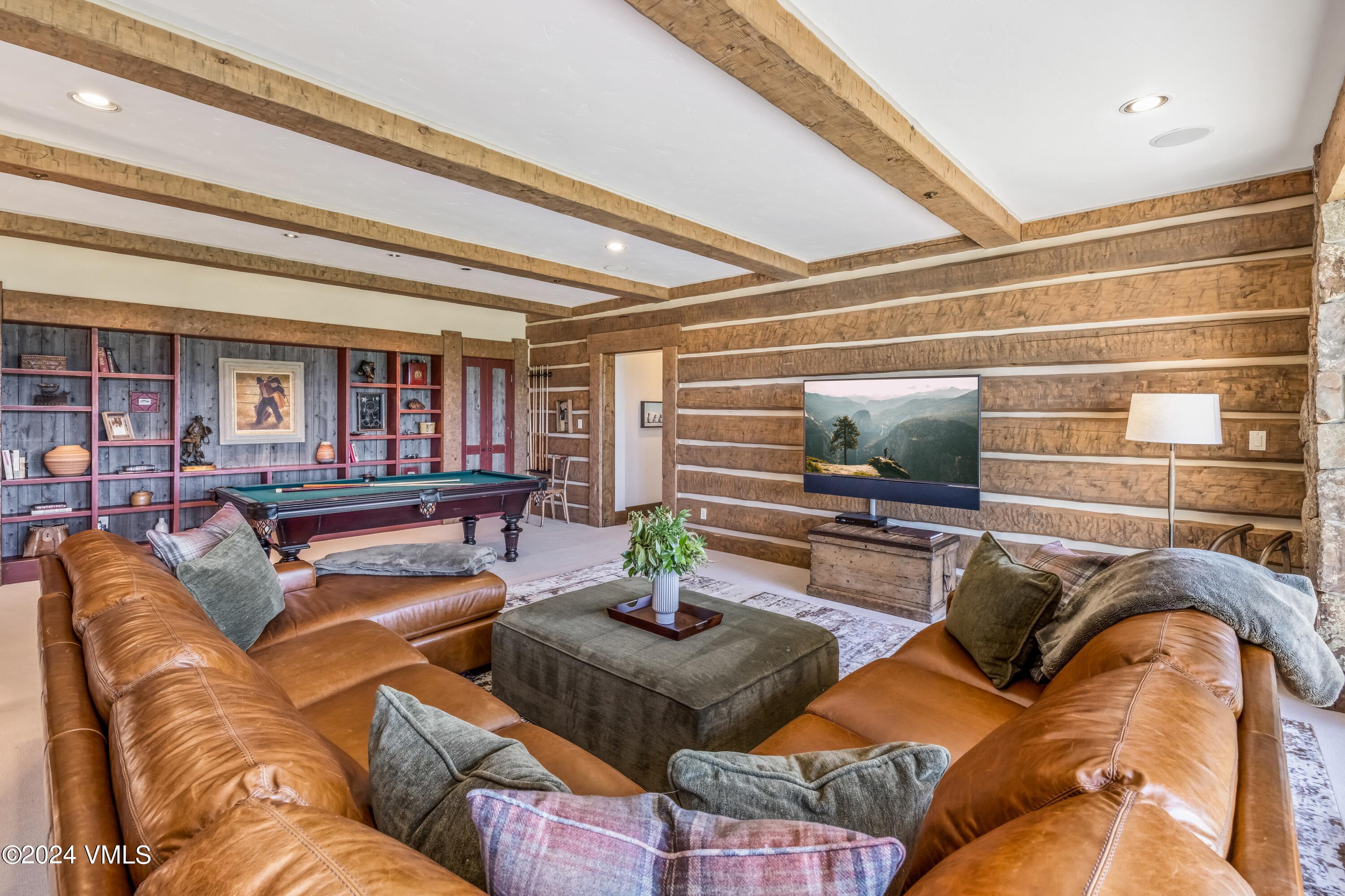 48 Jasmine Avon, CO 81620 - Photo 45 of 67 a living room with furniture and a flat screen tv